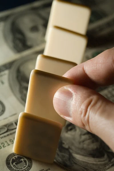 Domino y dólar estadounidense — Foto de Stock