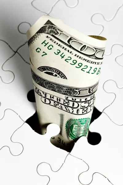Пазл доллара — стоковое фото