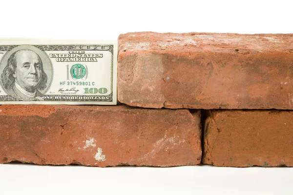 Z czerwonej cegły i Dolar — Zdjęcie stockowe
