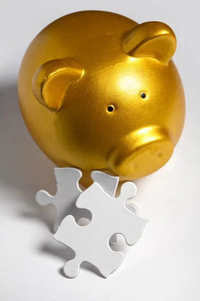 Piggy bank and Puzzle — Stockfoto