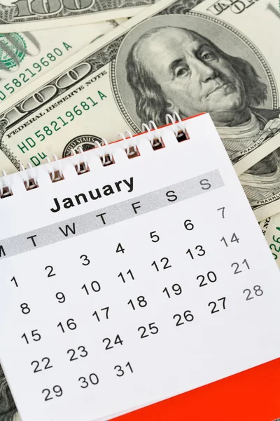 Kalender und Dollar — Stockfoto