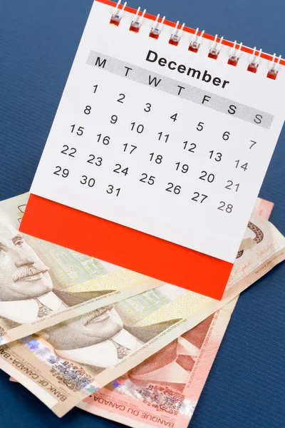 Kalendář a kanadský dolar — Stock fotografie
