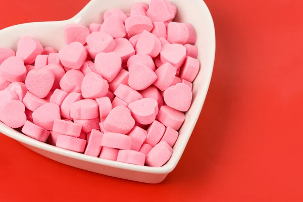 Růžové srdce tvar cukroví — Stock fotografie