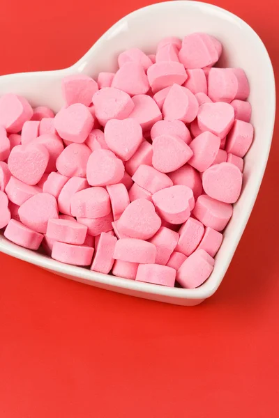 Bonbons en forme de coeur rose — Photo