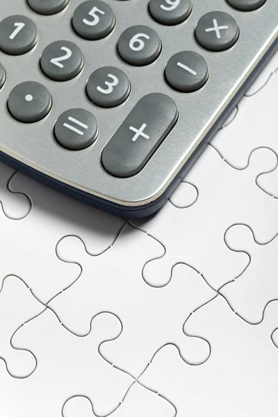 Számológép és puzzle — Stock Fotó