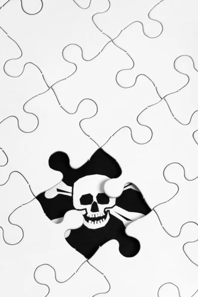 Puzzle a pirátská vlajka — Stock fotografie