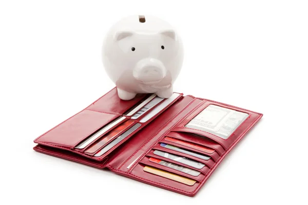 Czerwony portfel i piggy bank — Zdjęcie stockowe