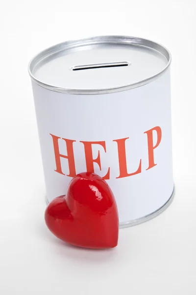 Donation box och rött hjärta — Stockfoto