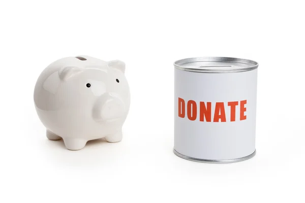 Spendenbox und Sparschwein — Stockfoto