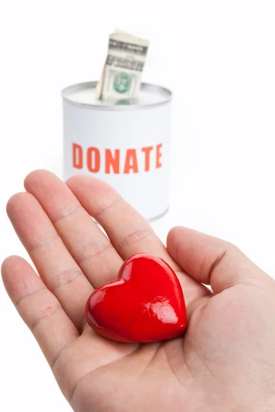 Caixa de doação e coração vermelho — Fotografia de Stock