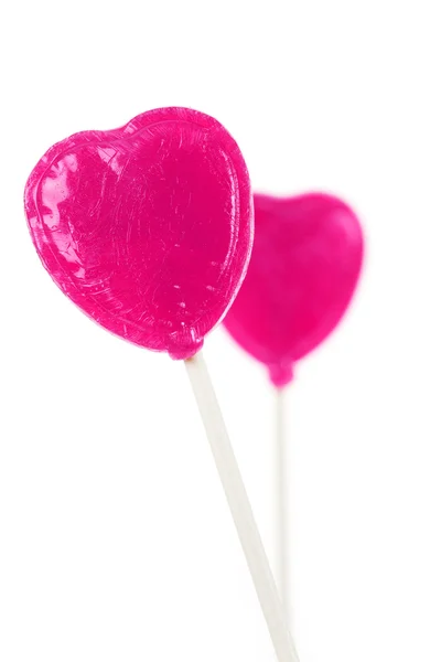 粉红的心形状棒棒糖 — 图库照片