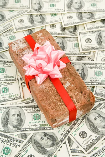 Prank gift and dollars — Stock Photo, Image
