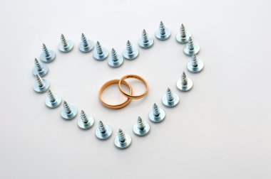 Screws and wedding rings clipart