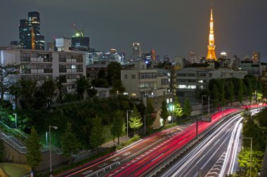 City night scene with car motion lights clipart