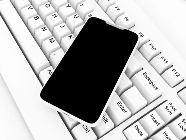 Мобильный и клавиатура на белом фоне — стоковое фото