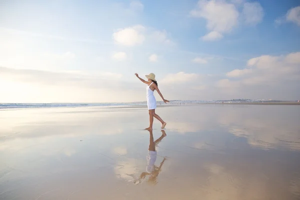 Happy woman reflected on ground — Stock Photo, Image