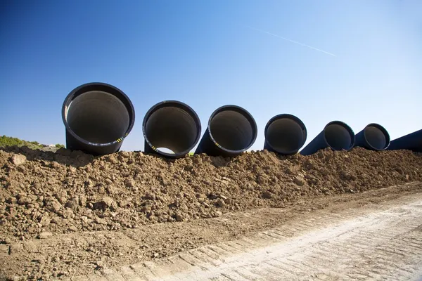 Pipelines on the mud — Stock Photo, Image