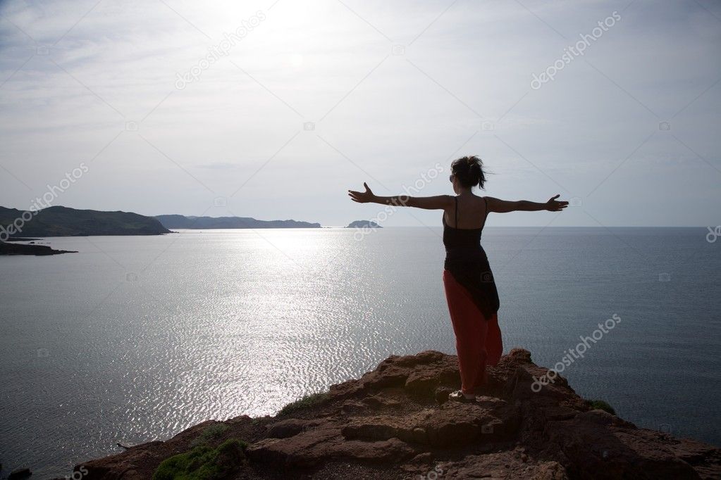 Woman over Menorca north coastline