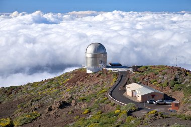 Observatory over clouds clipart