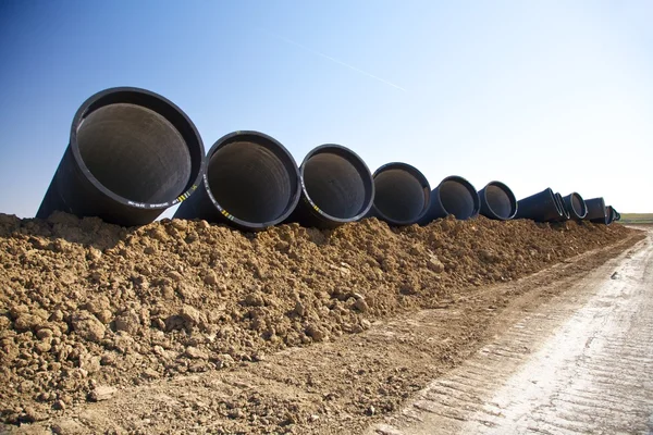 Pipes on the mud — Stock Photo, Image