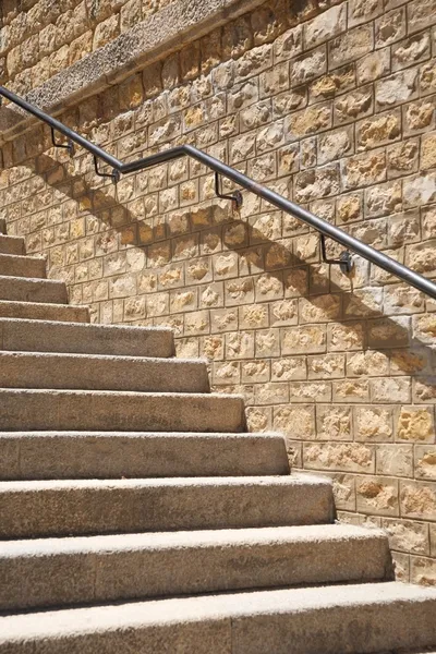 Stone steps with metal banister — Stock Photo, Image