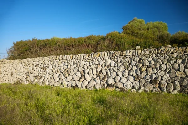 Wall of stones in Menorca — Stock Photo, Image
