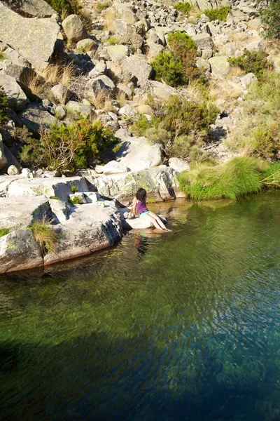 Woman in a lake at Gredos — Stock Photo, Image