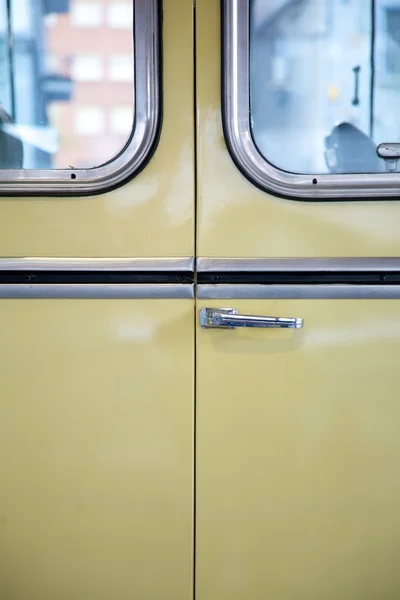 stock image Yellow retro handle bus door