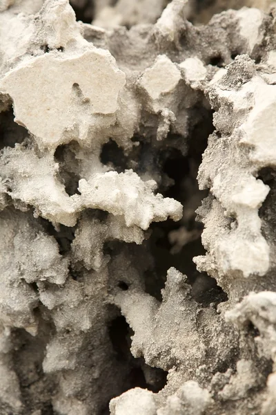 Hål i vit erosioned rock — Stockfoto