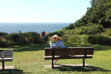 Enjoying a summer day at the Oregon coast. clipart