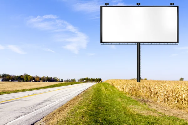 Billboard na estrada do país — Fotografia de Stock