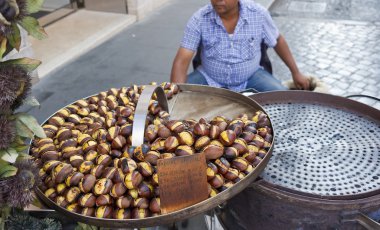 Roasted chestnuts for sale clipart