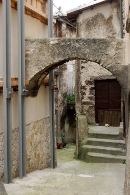 Old stone arch - Assergi - Abruzzo - Italy clipart