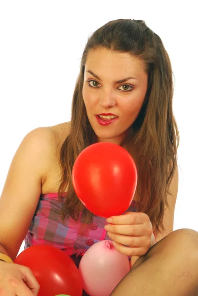 Playing with balloons Stock Image