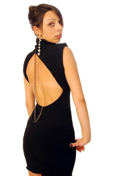 A beautiful brunette in an elegant evening dress — Stock Photo, Image