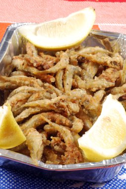 A basket of tasty fried fish clipart