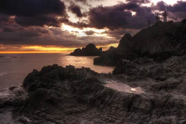 Beautiful landscape with lighthouse and rocks near Almería, Cabo de Gata, S — Stok Foto