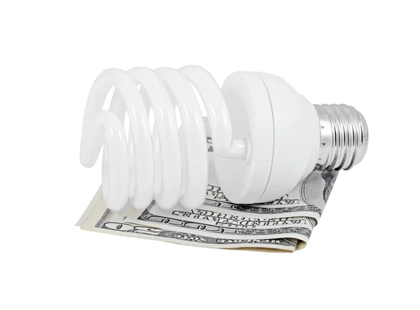 Energiebesparende lamp en geld — Stockfoto