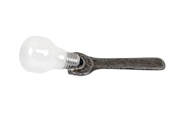 Alter rostiger Schraubenschlüssel und Lampe — Stockfoto