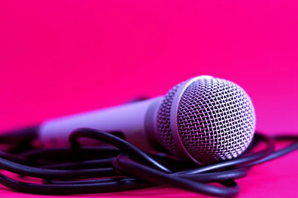 stock image Microphone on pink