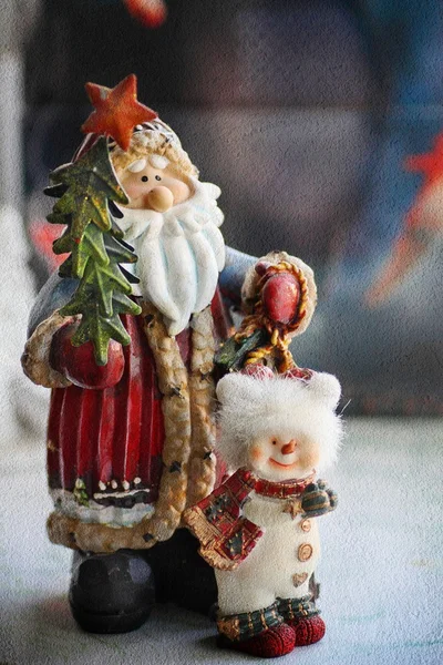 Weihnachtsmann und Schneemann — Stockfoto