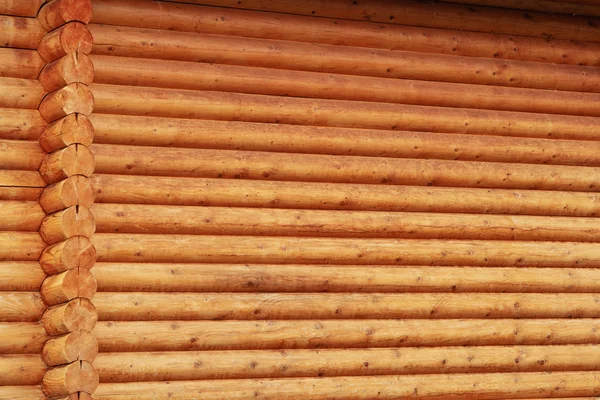 Ξύλινα κούτσουρα τοίχο του υποβάθρου εξοχική κατοικία — Φωτογραφία Αρχείου