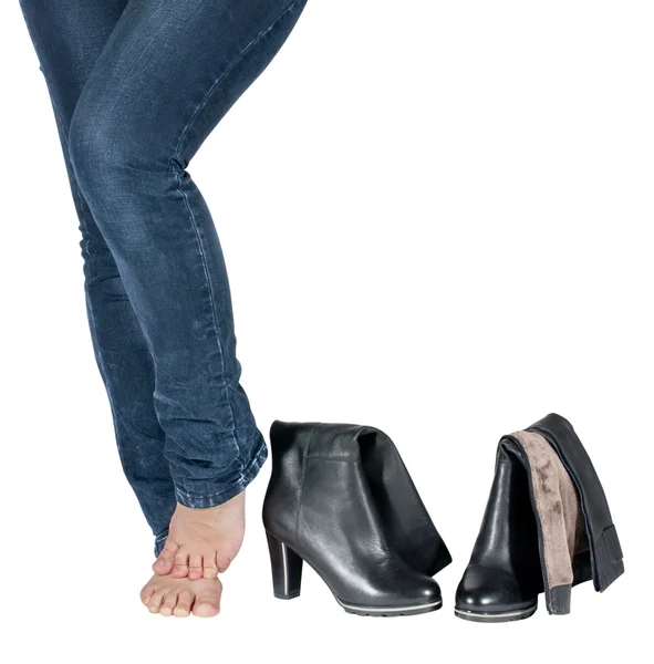 Mooie vrouwelijke benen en laarzen geïsoleerd — Stockfoto