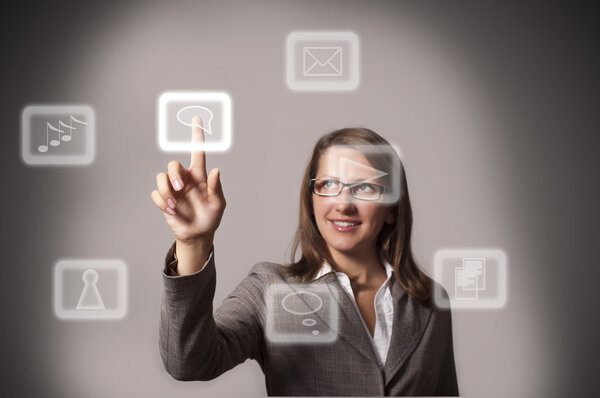 Woman pushing a button on a touch screen interface