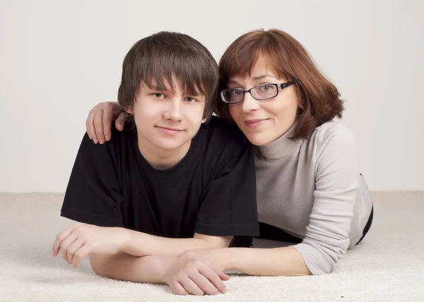 Mother and son are together and smile — Stock Photo, Image