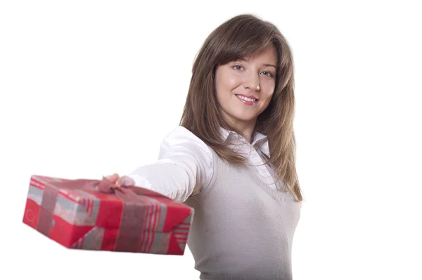 Young smiling woman holding gift — Stock Photo, Image