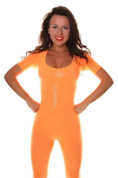 Sexy sportieve meisje in oranje fitness pak — Stockfoto