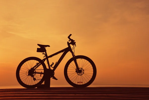 Reflction of bike silhouette — Stock Photo, Image