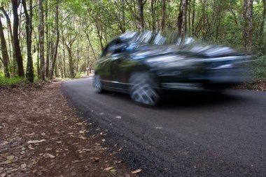 Moving black car