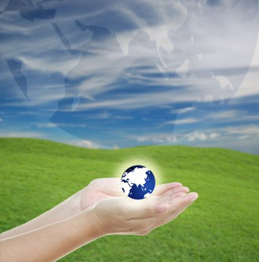 Globe in hand clipart